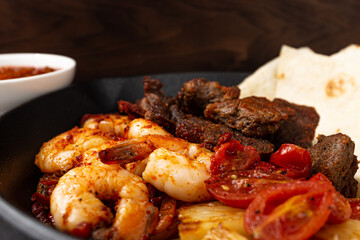 Fajitas, a food to eat meat, vegetables, and various ingredients wrapped in a tortilla