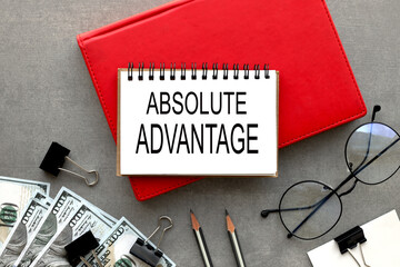 ABSOLUTE ADVANTAGE text on an open notepad. business concept