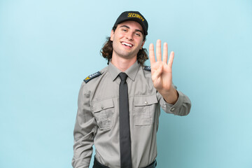 Young safeguard man isolated on blue background happy and counting four with fingers