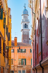 Cozy narrow streets of Venice city with old traditional architecture, Veneto, Italy. Tourism concept. Architecture and landmark of Venice. Cityscape of Venice.