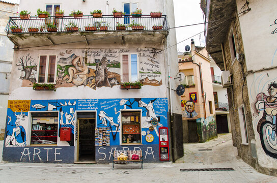 ORGOSOLO, SARDINIA, ITALY - APRIL 16, 2014: Street murals are the famous wall paintings of Orgosolo in Sardinia, Province of Nuoro, Sardinia, Italy.