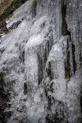 Fototapeta na wymiar frozen waterfall close up in winter