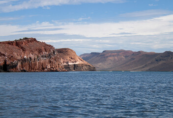 Red rocks of the protected biosphere reserve on Espiritu Santo Island in Baja California Sur, Mexico. 