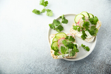 Healthy vegetable toasts on rice crackers	