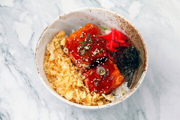 Freshly cooked Japanese food salmon rice bowl topping