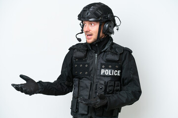 SWAT man over isolated white background with surprise facial expression