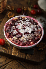 Homemade cherry crumble with walnut