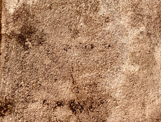 The texture of the old plaster wall with a very unusual beautiful pattern.