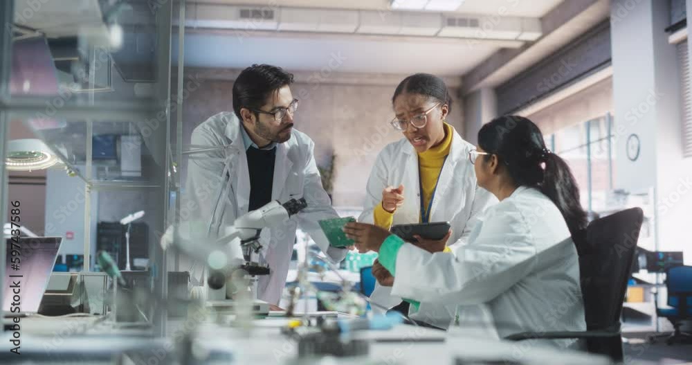 Poster Young Indian Female Having a Conversation with Science Teachers in a Laboratory. Student Working on a Circuit Board for a CPU Project. Young Scholar Asking About Upgrading the Microchip