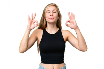 Young blonde woman over isolated background in zen pose