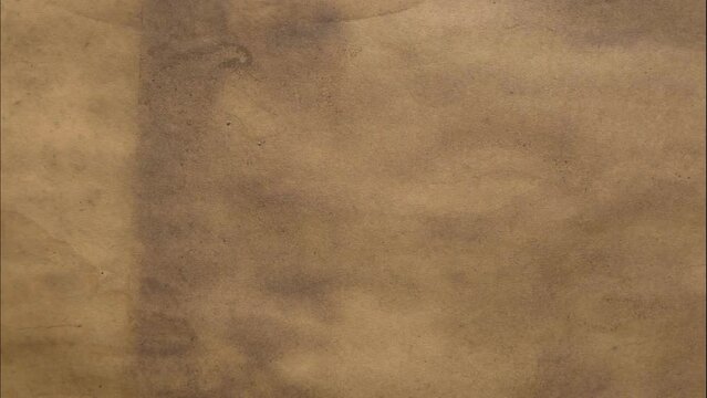 Stop motion coffee stains stained paper texture background dark brown 4k.