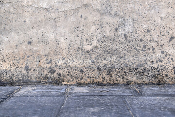 Dirty concrete wall that tile floor texture background.  Rough and grunge texture background. 