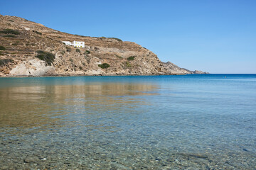 Fototapeta na wymiar The stunning turquoise sandy dream beach of Kolitsani in Ios Cyclades Greece