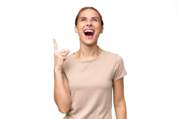 Young caucasian woman over isolated background pointing up and surprised