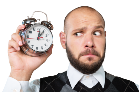 Young funny business man with retro clock