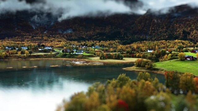 A miniaturized village and a camping place the shore o the fjord