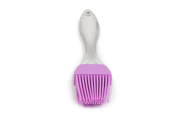 Pink culinary brush, kitchen utensil. Isolated on white background. Side view. High resolution...