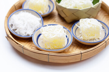 Steamed tapioca cake or cassava cake with grated coconut