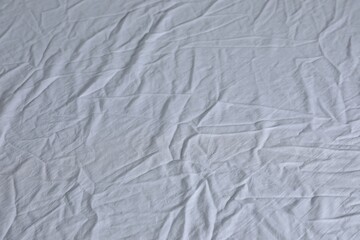 Crumpled white fabric as background, closeup view