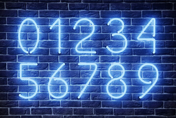 Glowing neon number signs on brick wall