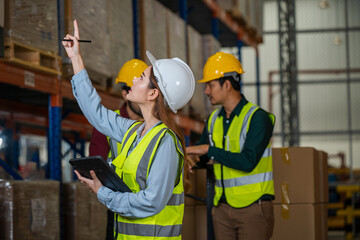 Warehouse worker checking in warehouse,This is a freight transportation and distribution warehouse. Industrial and industrial workers concept.
