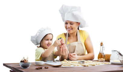 Happy mother and children cooking in the kitchen