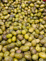 Green olive. Heap of organic olives. close up. food background