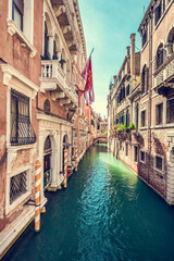 Fototapeta na wymiar Scenic narrow canal in Venice, Italy.