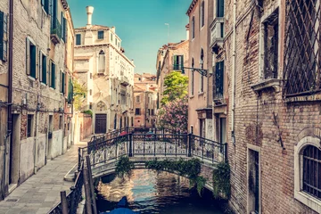 Romantic canal in Venice, Italy with scenic bridge. © Photocreo Bednarek