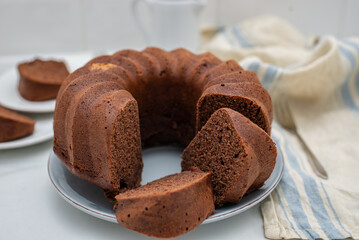 Chocolate Bundt Cake and a slice on a plate