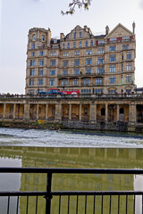 Fototapeta na wymiar Empire Hotel and The Colonnade on river Avon in Bath, Somerset, England