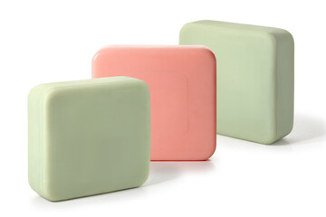 Three pieces of green and pink toilet soap on a white background. Full depth of field. With clipping path