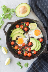 Avocado & black bean eggs - 597479112