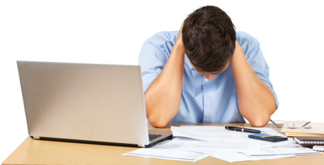 Portrait of a Desperate Businessman with Financial Figures and Laptop