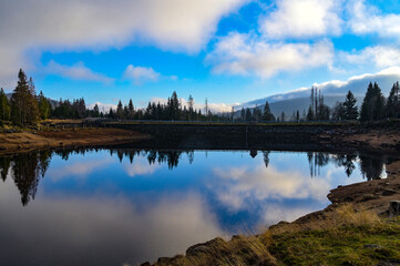 reflection of clouds in the lake, harz, germany