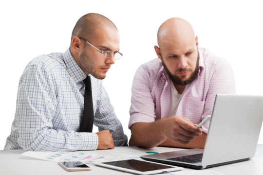 Team of serious businesspeople working on office desk