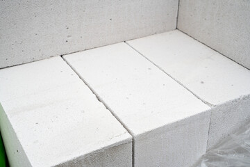 Folded aerated concrete brick, close-up. Universal lightweight building aerated concrete block