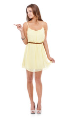 Fashion, dress and promotion with a woman pointing on PNG, isolated on a transparent background as a brand ambassador. Hand gesture, product and marketing with an attractive young female model