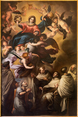 GENOVA, ITALY - MARCH 8, 2023: The painting of Madonna and sanits Carmelitans  in the church Chiesa di Nostra Signora del Carmine e Sant'Agnese by Raffaele Badaracco (1648 - 1726). - obrazy, fototapety, plakaty