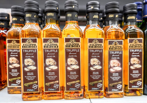 Filippo Berio truffle olive oil in bottles on the shelf in a superstore