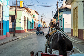 Horse-drawn carriage ride through the historic streets and neighborhoods of Trinidad