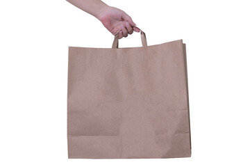 hand holding a shopping bag