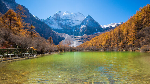 pearl lake with snow mountain  in yading nature reserve, Sichuan, China.