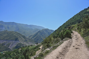 Dirt mountain road on a summer day