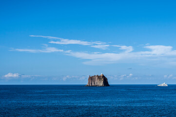 Small island of Strombolicchio / The island of Strombolicchio is a lava rock off Stromboli, Italy. - 597521763