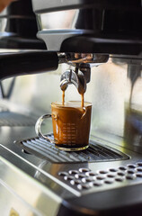 coffee machine making espresso in a cup close up
