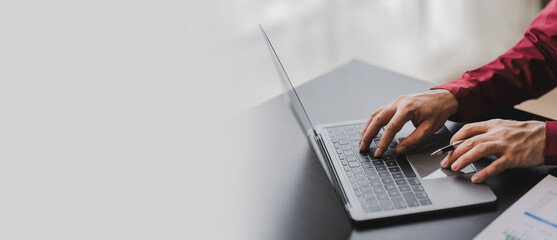 Close-up of printing data check data on laptop