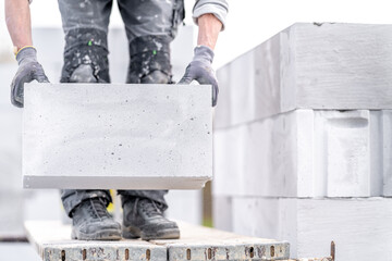 construction of a wall of a house made of concrete blocks