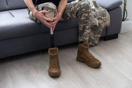 Soldier Artificial Prosthetic leg. War Veteran - Powered by Adobe