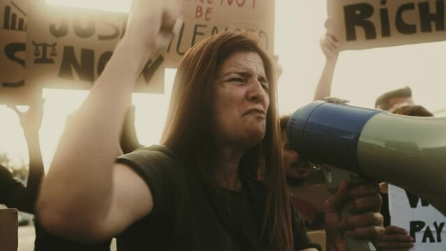 Multiracial people protesting against financial crisis and global inflation - Economic justice activism concept
